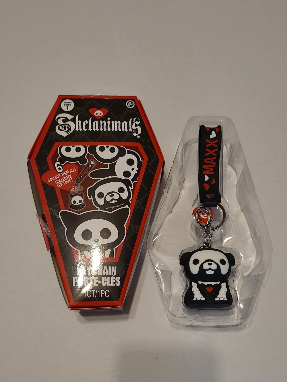 Skelanimals Series 1 collectible figural keychain featuring Maxx the Bulldog